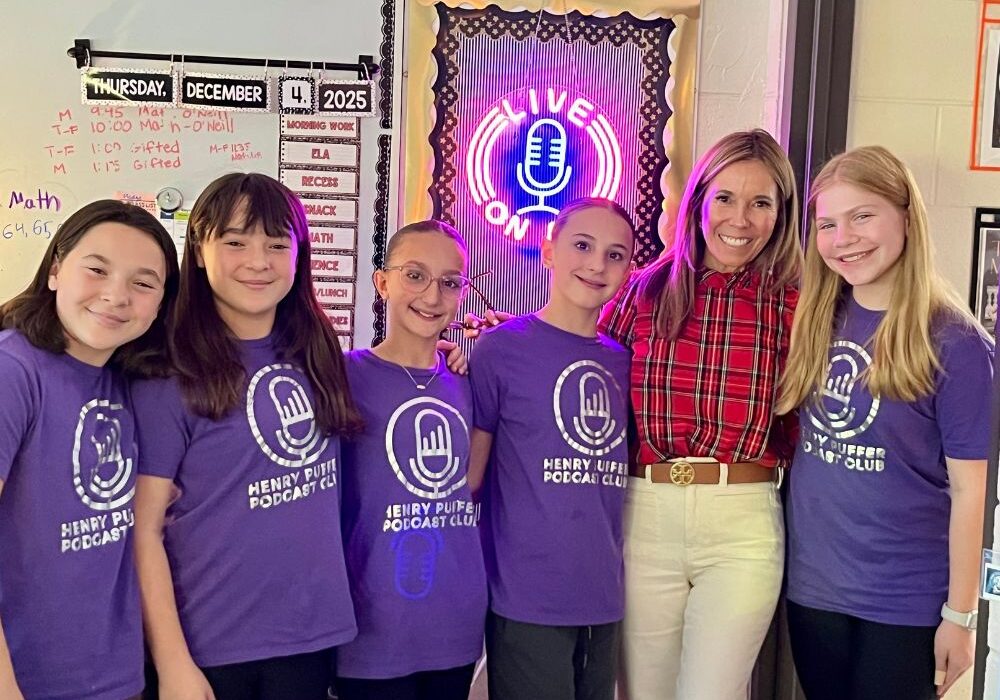 Christine-Reynolds-and-some-of-her-podcast-club-students-go-off-air-after-recording-an-episode-on-Dec.-4