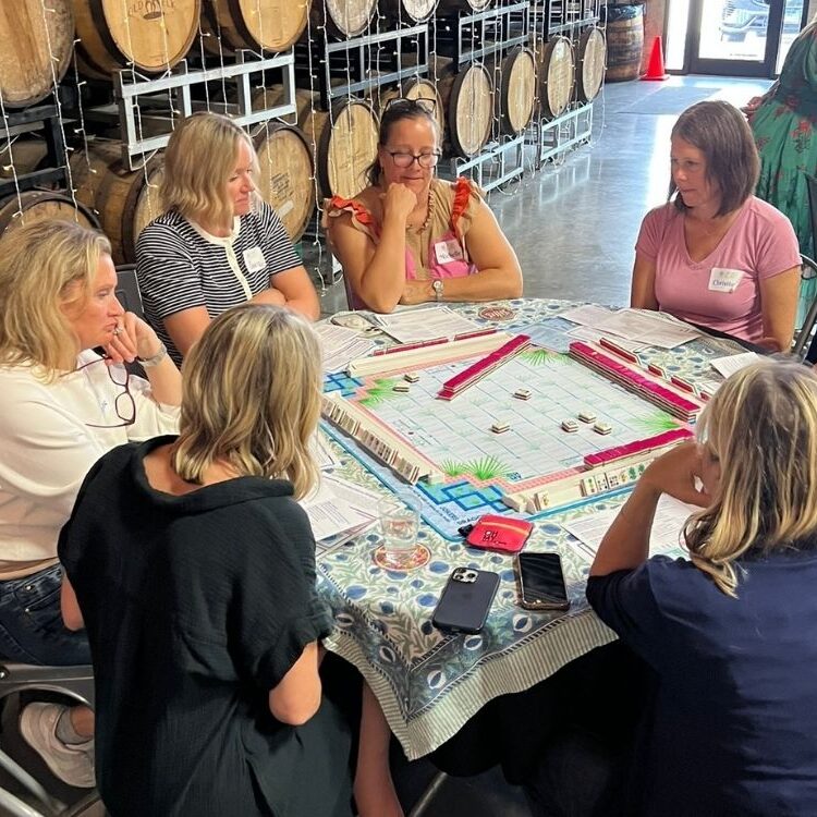 Local women learn
mahjong at a class
Colleen Loftus hosted
at Alter Brewing in
Downers Grove.