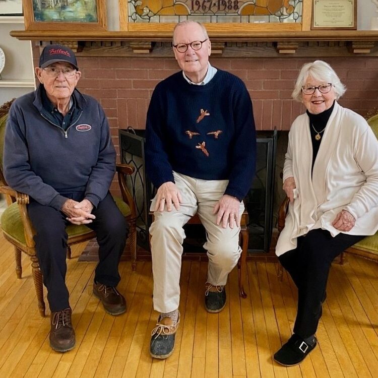 Welcoming visitors to explore the Oak Brook Historical Society’s newest exhibits are Don Fuller, Fullersburg Historic Foundation President; John Baar, OBHS Board member; and Elizabeth Arts, OBHS President.