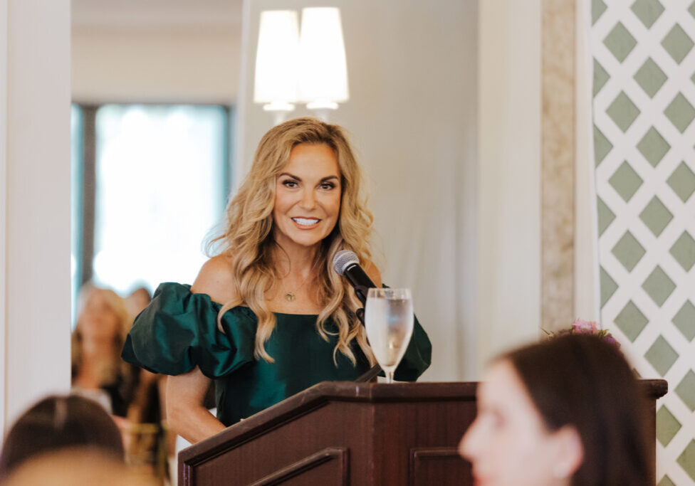 Tina Weller speaking at the Hinsdale Junior Women's Club <i>Ladies who Lead</i> Luncheon.